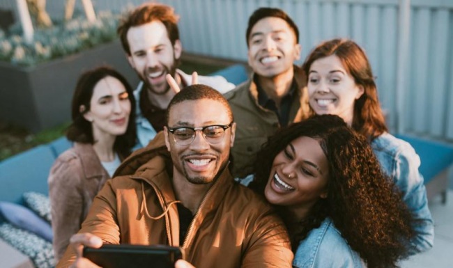Find your perfect fit at University Village at Charlotte friends take a group selfie outdoors